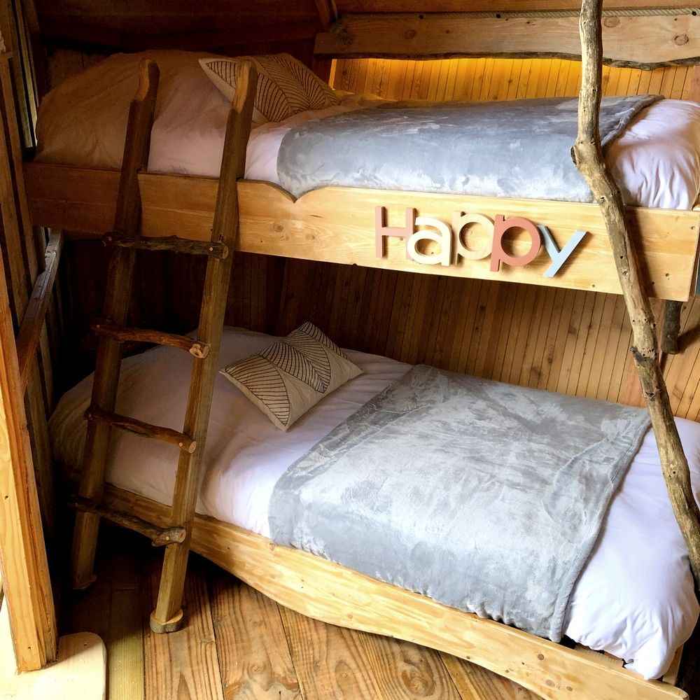 Photo-01-04-2018-12-28-29-compressor Chalet en bois à Bourgogne avec lits superposés et décoration chaleureuse.